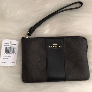 SOLD ON NEXTDOOR Coach wristlet
